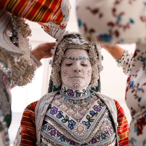 Melissa Guerrero, a U.S. citizen of Mexican origin, wearing traditional wedding makeup and a traditional costume, is prepared for her wedding ceremony in the village Donje Ljubinje, near Prizren, Kosovo August 5, 2022. REUTERS/Fatos Bytyci